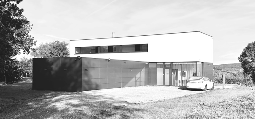 projet-malmedy-contemporain-crepis-trespa-toit-plat-vitrage-vue-jardin4